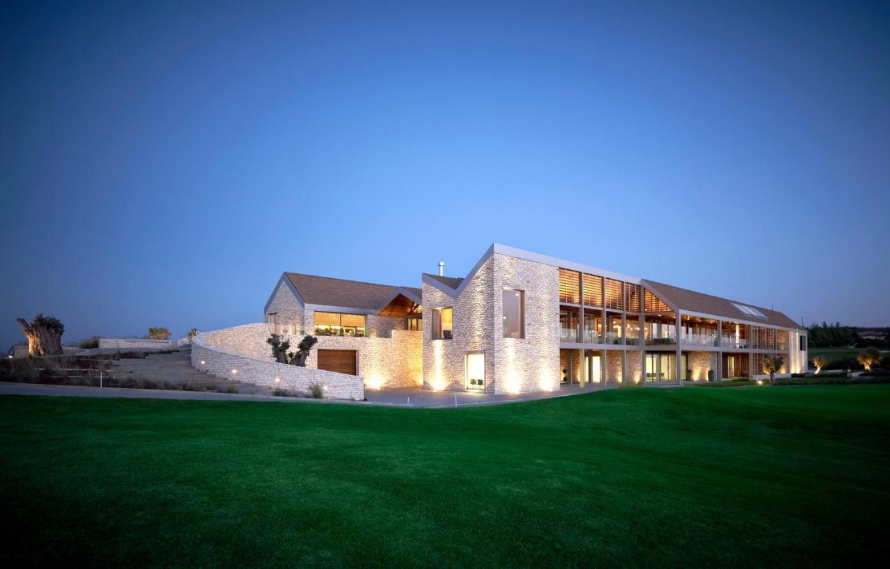 Minthis Resort Tsadha Exterior photo The clubhouse at the Royal County of Berkshire Golf Club