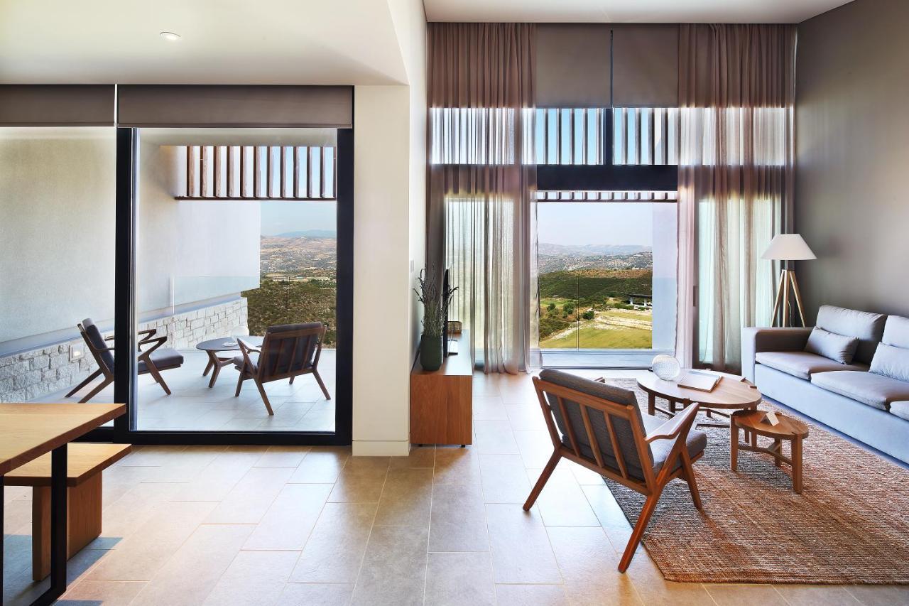 Minthis Resort Tsadha Exterior photo The interior of a typical suite at the hotel